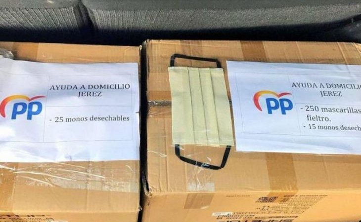 Mascarillas repartidas por el PP con el logo del partido