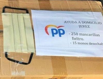 El PP reparte mascarillas con su logotipo que no están homologadas