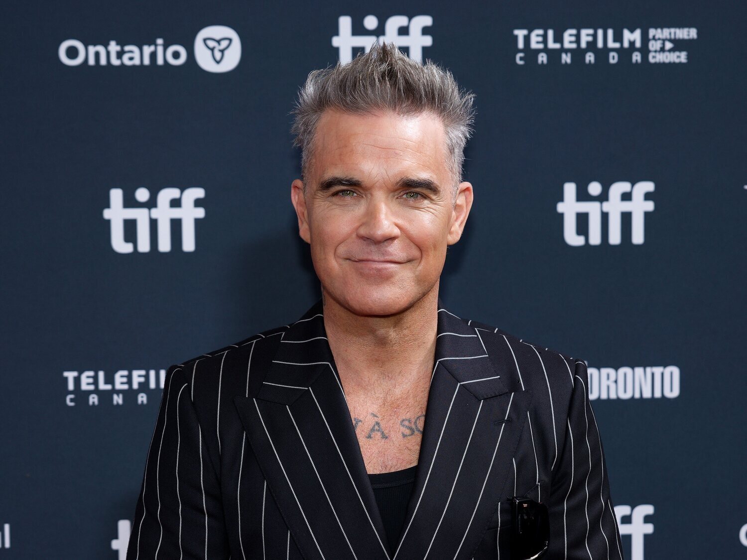 Qué es el síndrome de Tourette: la enfermedad que padece Robbie Williams