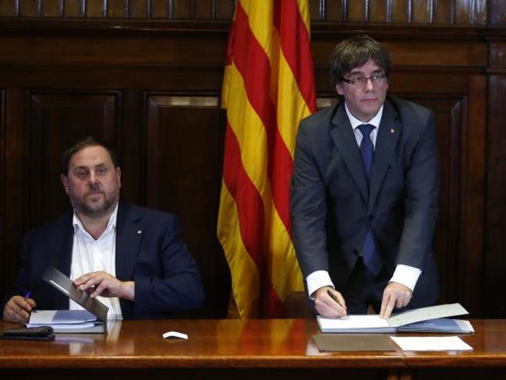 Oriol Junqueras y Carles Puigdemont