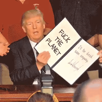 Donald Trump firmando la destrucción del Planeta