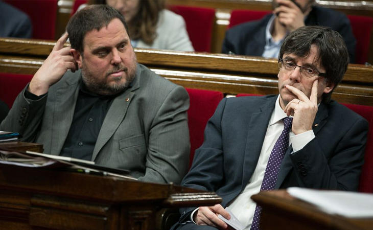 Oriol Junqueras y Carles Puigdemont en el Parlament