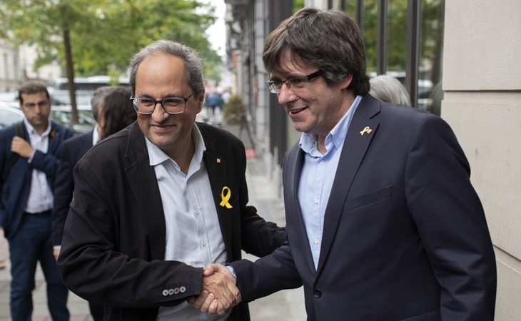Quim Torra, presidente de PDeCAT y Carles Puigdemont