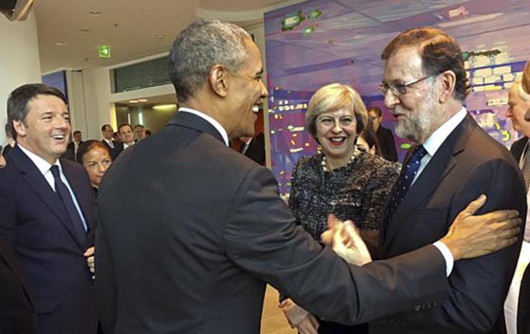 Obama y Rajoy se encuentran en la Cumbre de Berlín